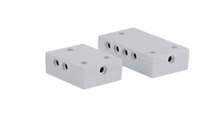 2 splitters: one is a 4-way splitter which is smaller and has 4 ports for the LED lights and a power port on the width. The 8-way splitter sits behind. It is slightly bigger with four ports for LED lights on each side and a power port on the width.