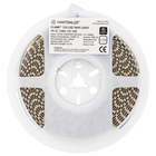 LED strip in a plastic spool with a product detail sticker on it.